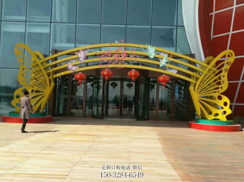 安义蝴蝶拱门雕塑,镂空烤漆效果,不锈钢小区标识雕塑 安义蝴蝶拱门雕塑,镂空烤漆效果,不锈钢小区标识雕塑
